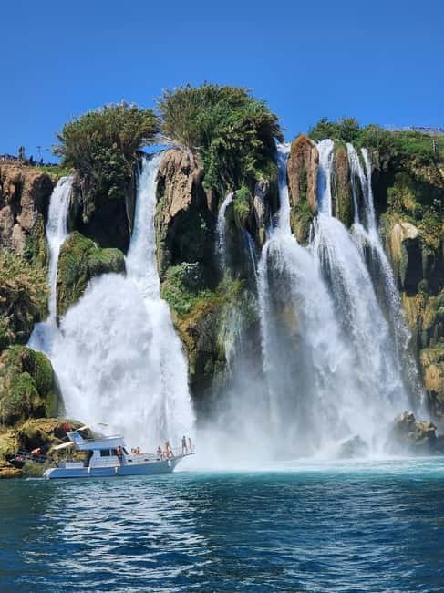 Antalya: 2-hourYachtTour toLowerDudenFalls with audioİnfo - The Audio Guide on WhatsApp: History You Can Listen to Later