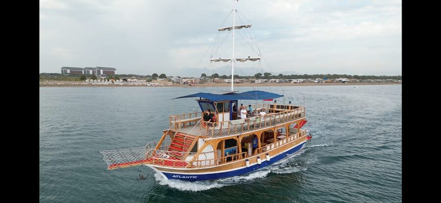 Antalya: Beach & Waterfalls Boat Trip w/ Lunch & Soft Drinks - Onboard setup: decks, bar service, and the pirate-style entertainment