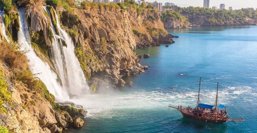 Antalya: Beach & Waterfalls Boat Trip w/ Lunch & Soft Drinks - Getting to the port: hotel transfer and the FREEDOM DELUXE clue