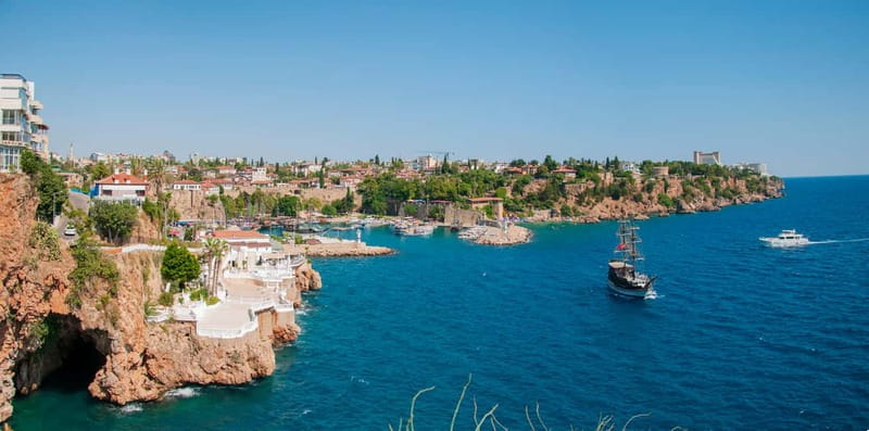 Antalya: Falez Cliffs & Waterfalls Boat Trip with Lunch - Entering the scene: Falez cliffs and the Düden Waterfalls vibe