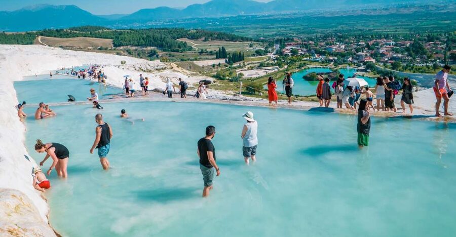 Antalya: Pamukkale Hot Springs & Hierapolis Small Group Tour - Entering Pamukkale’s hot springs: the cotton-castle effect up close