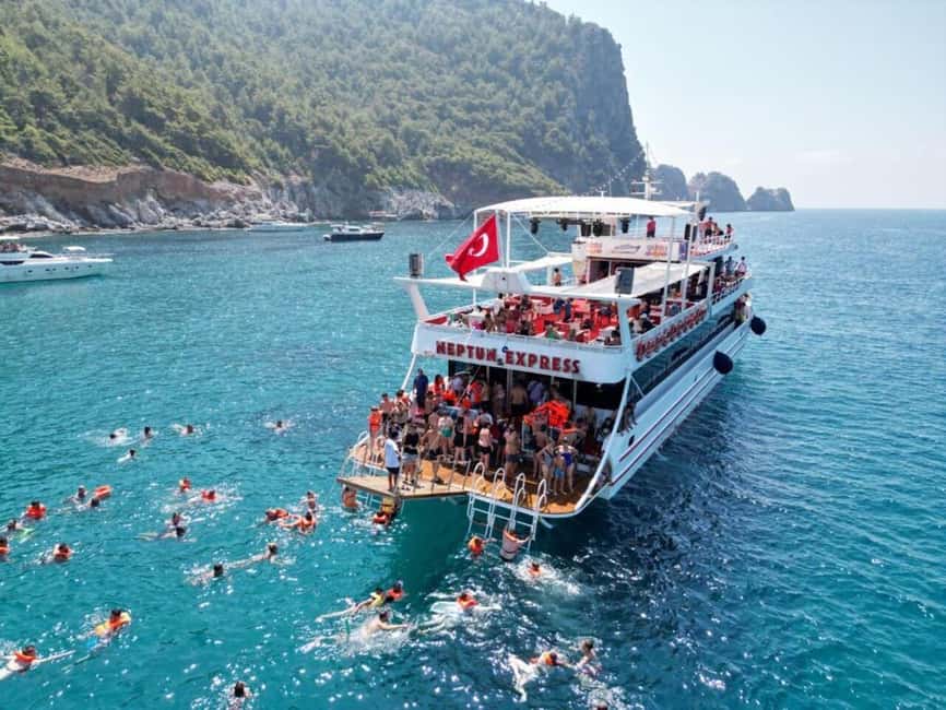 From Alanya: Boat Tour with Unlimited Soft Drinks and Lunch - Cleopatra Beach swim: golden sand, sea life, and easy time