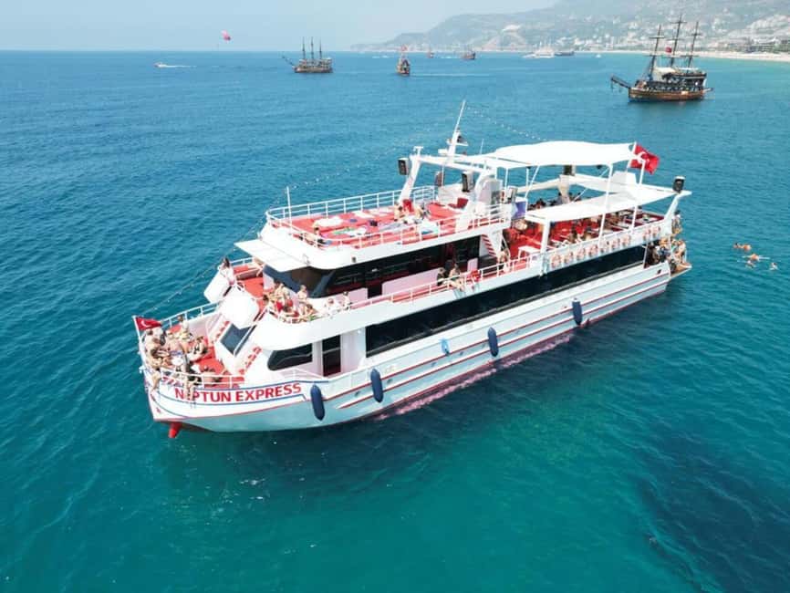 From Alanya: Boat Tour with Unlimited Soft Drinks and Lunch - Getting on board: marina meeting, hotel pickup, and boat basics