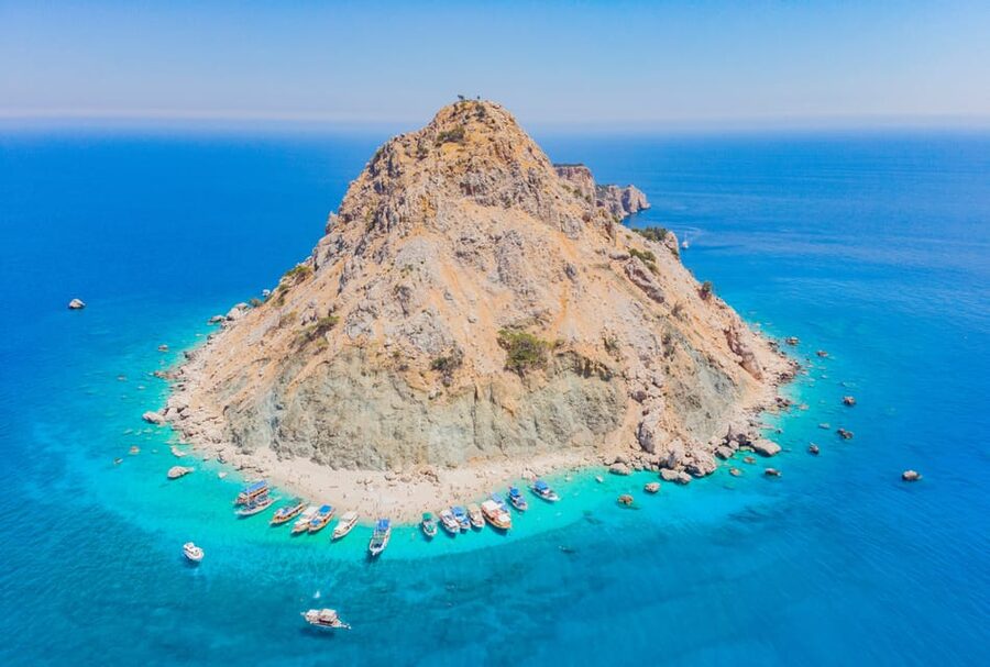 From Antalya: Suluada Island Boat Trip with Lunch - Adrasan Port and the sail out over the Mediterranean