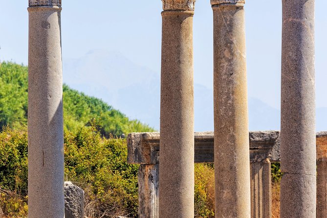 Perge, Aspendos and Waterfalls Sightseeing Tour - Side: pomegranate-named harbor, Temple of Apollo by the sea, and Roman baths turned museum